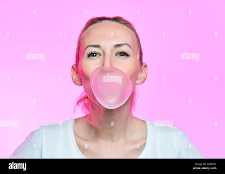 Blowing bubble gum