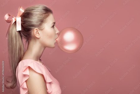 Blowing bubble gum