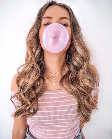 Blowing bubble gum